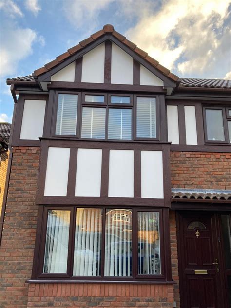 mock tudor cladding replacement